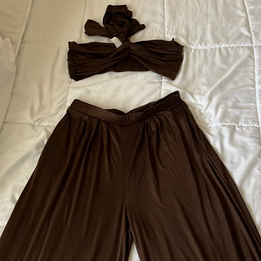 Two piece pant suit. Size large in brown and black. Never worn.